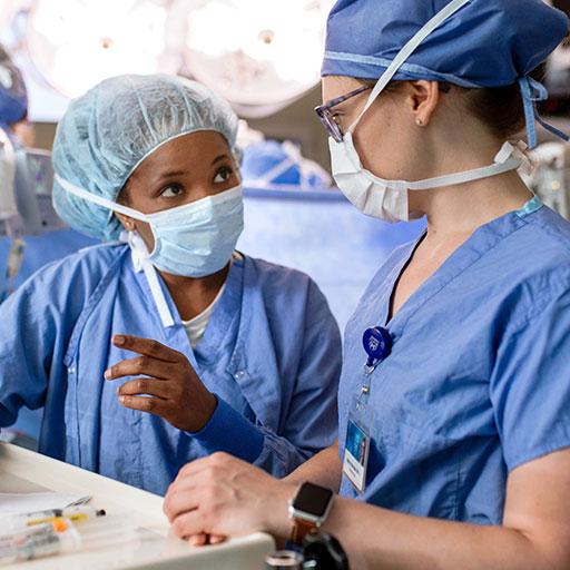 Mayo Clinic trainee and faculty member in operating room